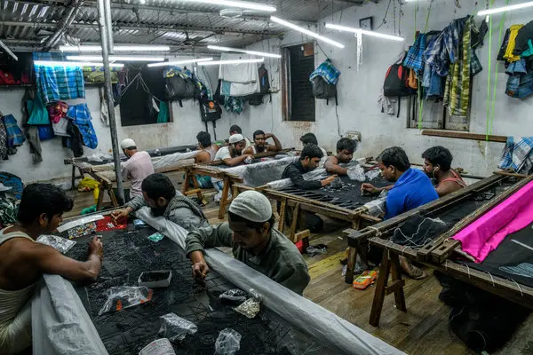 workers in a dark factory